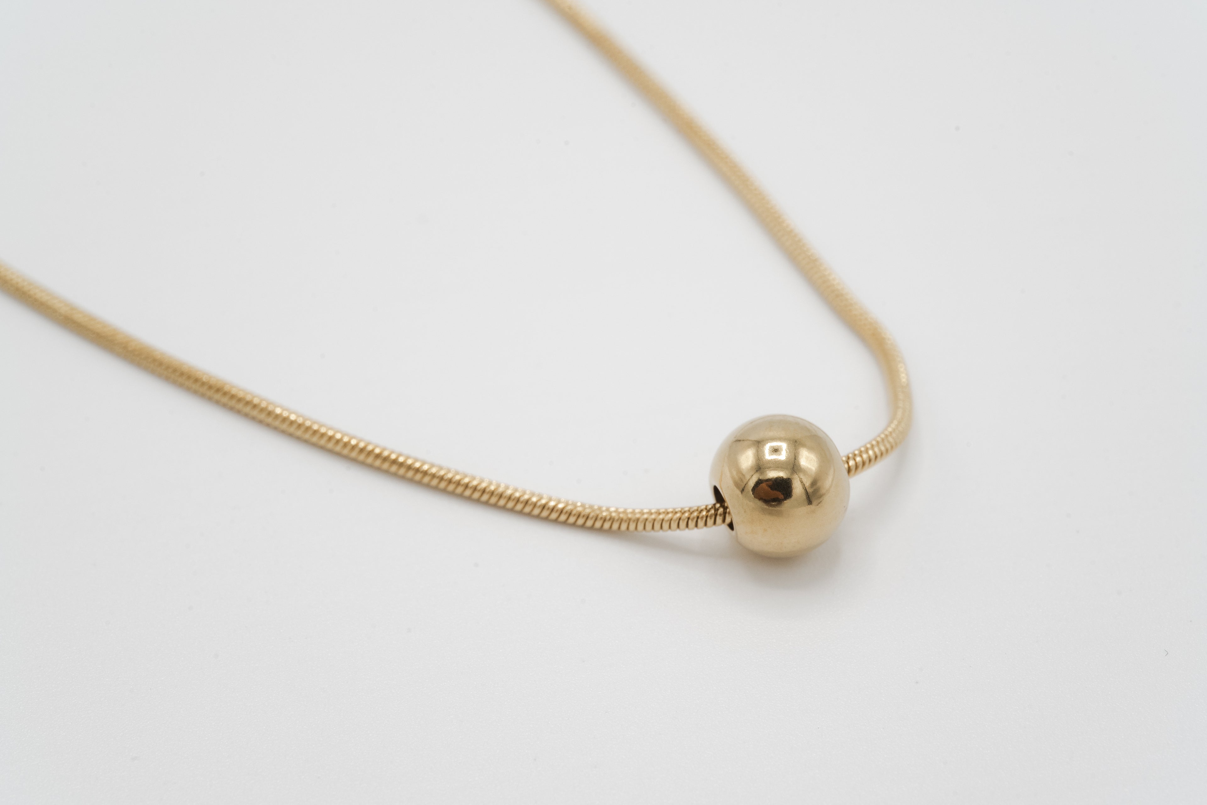Golden Sphere Pendant Necklace
