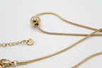 Golden Sphere Pendant Necklace